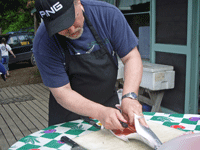 Chef Tom Slicing Open Fish